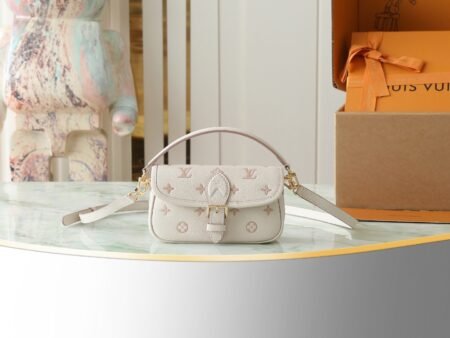 M13642 cream-colored full leather mini baguette bag